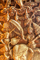 Buddism style 3D Angels textured Brick wall at Wat Sisrathong temple, Nakhon Pathom City, Thailand