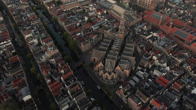 Oude Kerk Church in Amsterdam, Netherlands while golden hour near the red light district