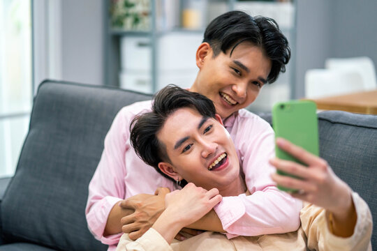 Young gay couple making selfie and feeling happy. Concept of LGBT and Love.