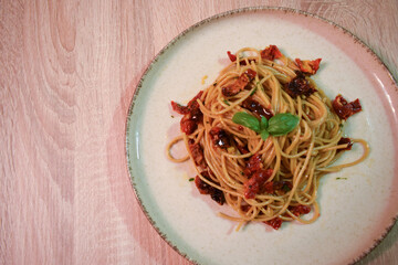 Spaghetti with Sun Dried Tomatoes and Basil.