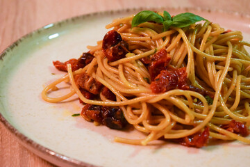 Spaghetti with Sun Dried Tomatoes and Basil.