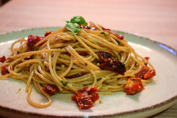 Spaghetti with Sun Dried Tomatoes and Basil.