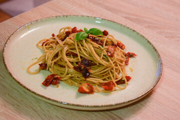 Spaghetti with Sun Dried Tomatoes and Basil.