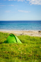 Seascape with tent on beach, Lofoten Norway