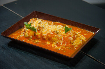big bad wolf with tomato sauce and cheese
