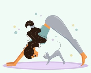 A funny girl is training next to her gray cat on a yoga mat. Young woman in dog pose exercising next to her pet friend stretching together. Vector, cartoon flat style.