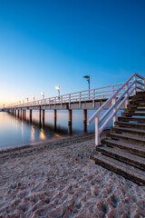 sunrise over the pier in Mechelinki. Baltic Sea 
