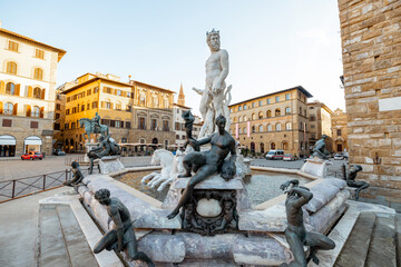 Morning view on fountain of Neptune on Signoria square in Florence. Concept of art and architecture...