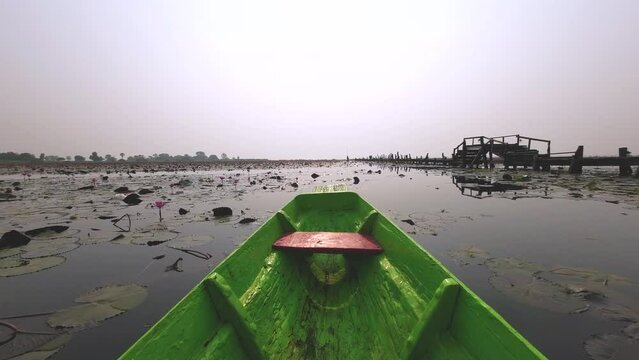 Take a scenic boat ride at Thung Bua Daeng, Bueng Lahan, Chaiyaphum, Thailand.
