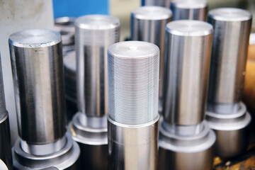 metal chrome parts in the form of threaded cylinders