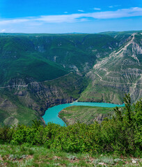mountain landscape, view of the deep canyon with blue water, valley of the Sulak river in Dagestan