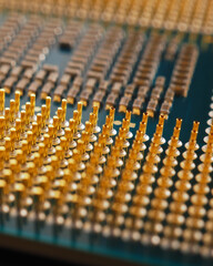 Processor microprocessor of a computer or laptop close up. CPU, semiconductor, pins and connectors. Vertical stories about electronic and computing equipment. Digital technologies. Macro