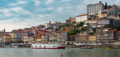 View of Porto Portugal during sunset along the river