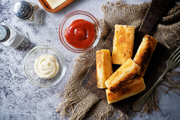 Cheese roll bread with mayonnaise and ketchup sauce
