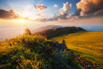 Naklejka na ściany i meble Fantastic view of the sunset over the mountain ranges. Carpathian mountains, Ukraine, Europe.