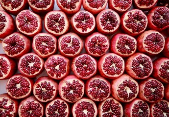 Red juicy pomegranate fruits on the market