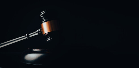 gavel of the judge on a dark background