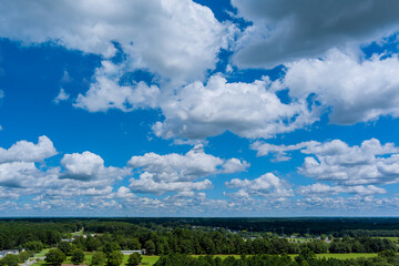 Panoramic aerial view white cloud in horizon summer of residential district at suburban development with between forest in Inman, South Carolina USA