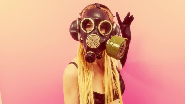 Gasmask covered disco dancer woman 