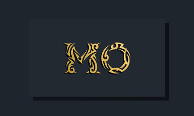 Luxury initial letters MO logo design. It will be use for Restaurant, Royalty, Boutique, Hotel, Heraldic, Jewelry, Fashion and other vector illustration