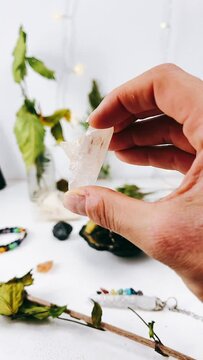person holding a Clear crystal, healing stones, Healing crystals, Spiritual, healing, Close up of a crystal