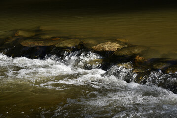 water flowing over rocks