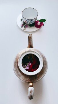 a teapot, afternoon brunch, tea time, flowers in a tea pot, cup of milk with flower, coneptual art, food, plate, gourmet, isolated, appetizer, flower, dish, snack, delicious, lunch, vertical video, 