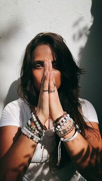A woman Practicing Prayer | Praying Hands | Spiritual Rituals 