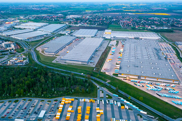Aerial view of a logistics park with a warehouse. Online store warehouses, logistics sorting...