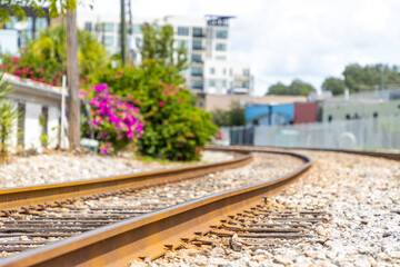 Fototapeta premium Railroad tracks through city