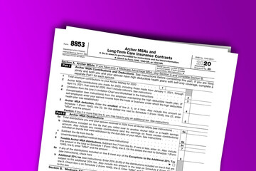 Form 8853 documentation published IRS USA 43873. American tax document on colored