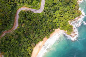 Aerial view of curve road along the seashore at Phuket Thailand beautiful seacoast and open sea in...