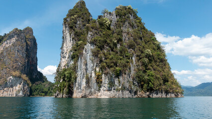 Aerial drone view of tropical Mountain peak in Thailand Beautiful archipelago islands Thailand Scenic mountains on the lake in Khao Sok National Park amazing nature landscape
