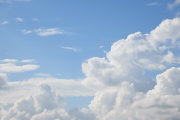 Cloudscape with blue sky and white clouds