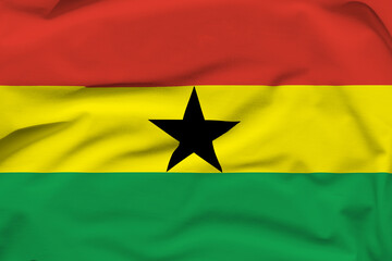 Ghana national flag, folds and hard shadows on the canvas