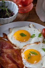 egg with bacon. Vertical photo