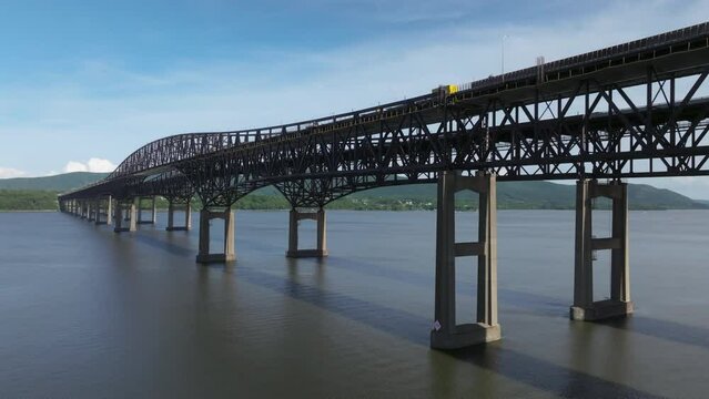 alt rising alongside Beacon Newburgh Bridge over the Hudson in NY