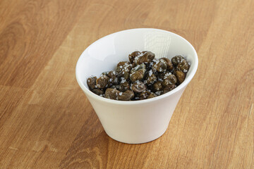 Salted marinated capers snack appetiser