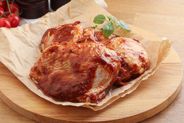 Marinated chicken leg in tomato sauce