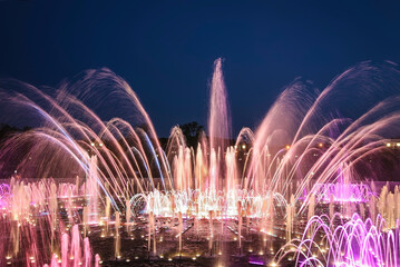 Light and musical fountain in the evening in the park of the Tsaritsyno Museum-Reserve. Moscow,...