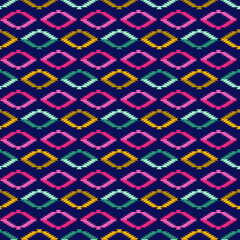 colorful tribal print with dark blue background seamless repeat pattern