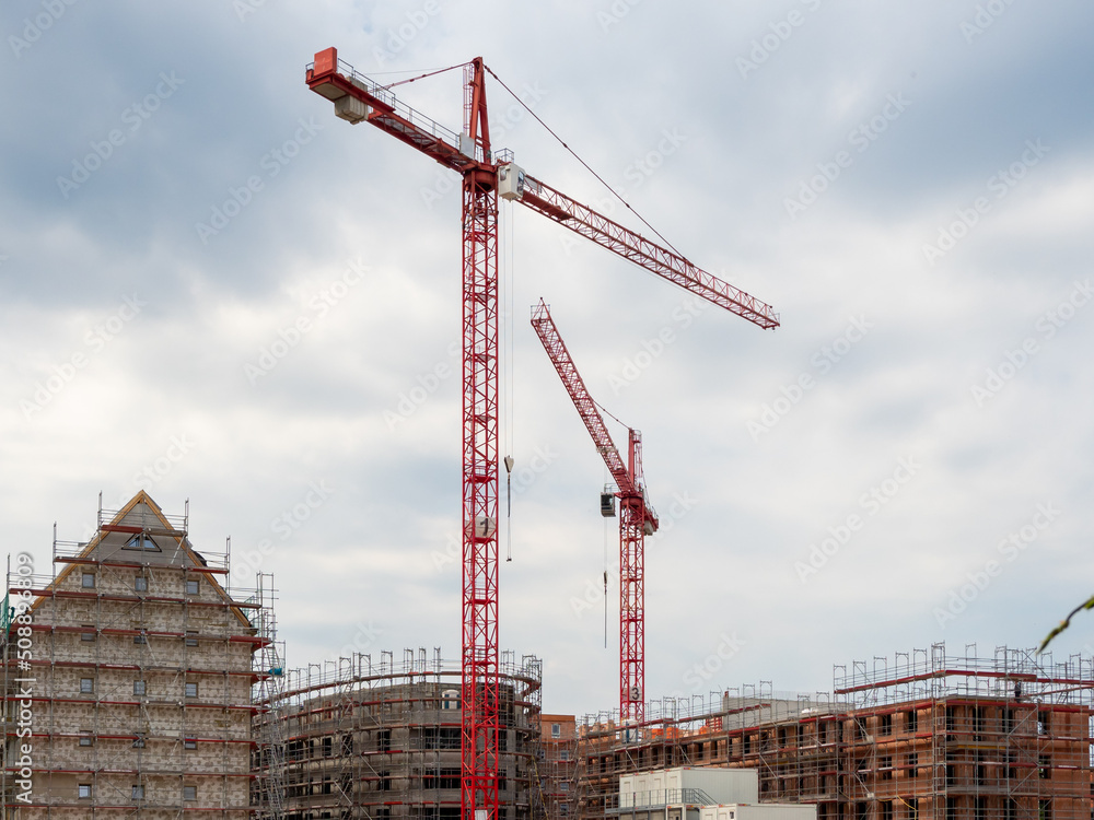 Wall mural Construction and tower cranes.