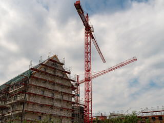 Fototapeta na wymiar Construction and tower cranes.