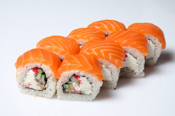 Tasty sushi and sushi roll set with wasabi and ginger on white background. Vegan sushi rolls. Seafood.