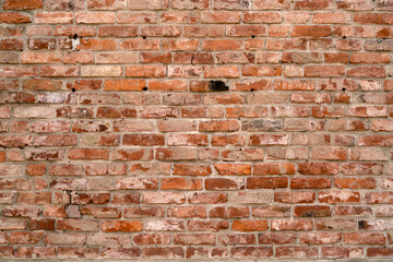 Brick wall of the building. Designer building background.