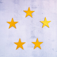 Customer Experience Concept. Five gold stars arranged in a circle on a white background.
