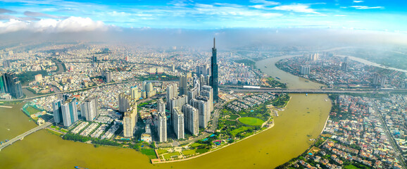 Aerial view of Ho Chi Minh City skyline and skyscrapers in center of heart business at downtown. Cityscape on Saigon river in Ho Chi Minh City, Vietnam © huythoai