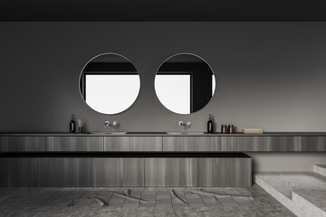 Grey bathroom interior with sink and mirror, accessories on dresser - obrazy, fototapety, plakaty