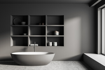 Fototapeta na wymiar Grey bathroom interior with tub, shelf with decoration and window