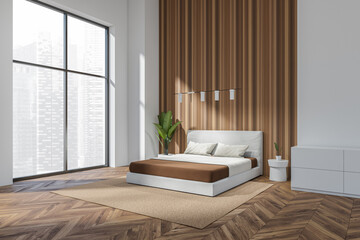 Modern bedroom interior with bed near panoramic window on city view